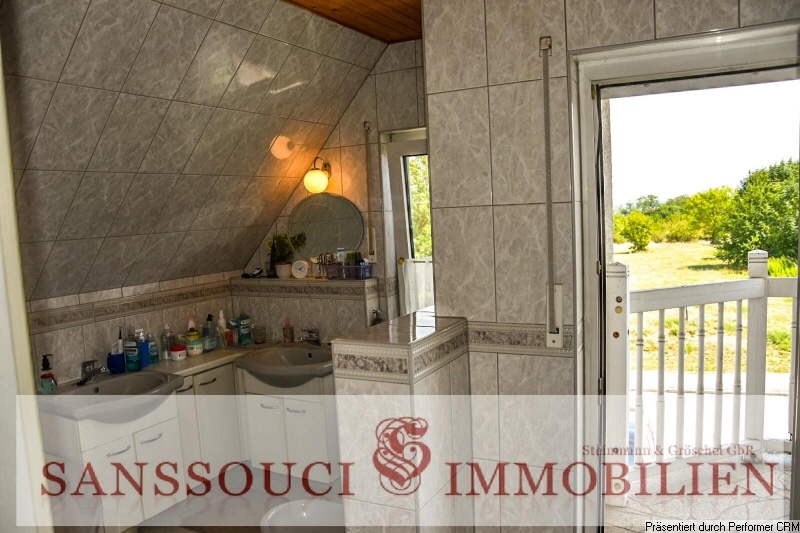 Wannenbad mit Balkonaustritt